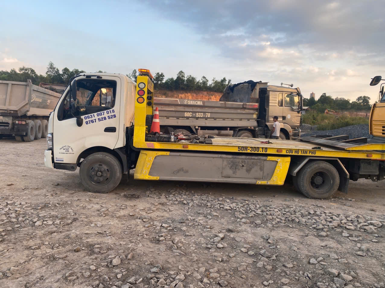 Kéo xe Ben từ mỏ đá Tân Cang đến Bình Chánh